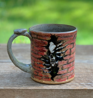 Peaking skull with dancing Skeleton Mug